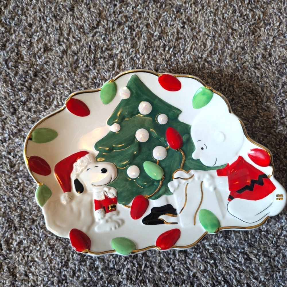 Retired Lenox Snoopy's Christmas Canape Plate. Measures 10".